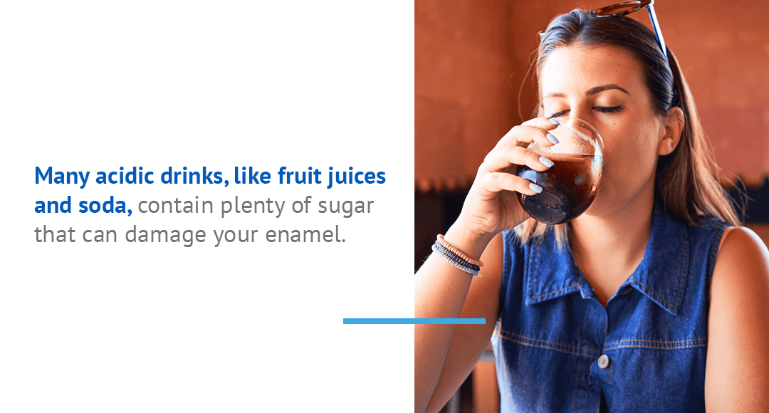 A woman drinking an acidic drink that can damage her enamel.