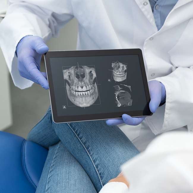 Dentist and patient consultation