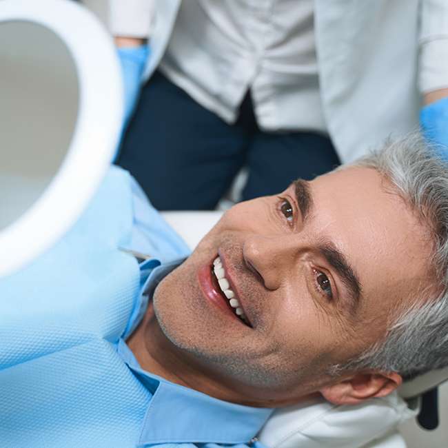 Patient smiling at their results